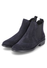Bottes basses en daim bleu marine avec panneaux latéraux élastiques, design classique et petit talon bloc. Motif brogue détaillé sur les orteils.