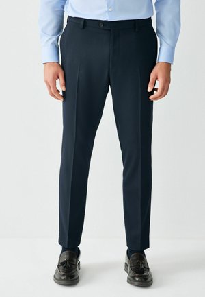 SKINNY FIT - TEXTURED SUIT TROUSERS  . - Trousers - navy blue