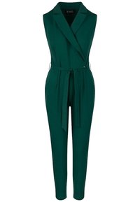 Ärmelloser grüner Jumpsuit mit einem Schalkragen, tailliertem Bund und schmal zulaufenden Beinen. Hergestellt aus einem weichen Stoff mit glatter Textur und minimaler Ausstattung.