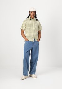 HUF TOTAL ECLIPSE SHIRT UNISEX - Button down-skjorte - mustard