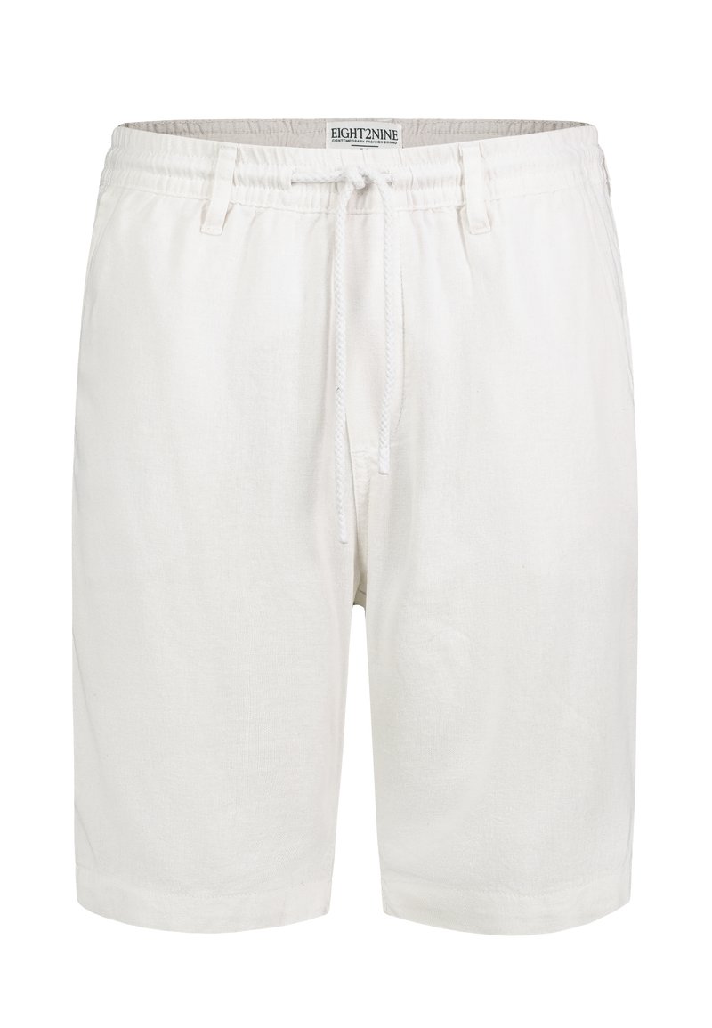 White, linen blend shorts with an elastic waistband, adjustable drawstring, side pockets, and a relaxed fit. No visible patterns or accents.