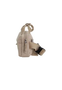 Beige Stofftasche mit rechteckiger Form, zwei Reißverschlüssen, einem Stoffgriff und einem verstellbaren Tragegurt. Glatte Textur und minimalistisches Design.