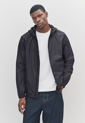 Next Vodotěsná bunda - black