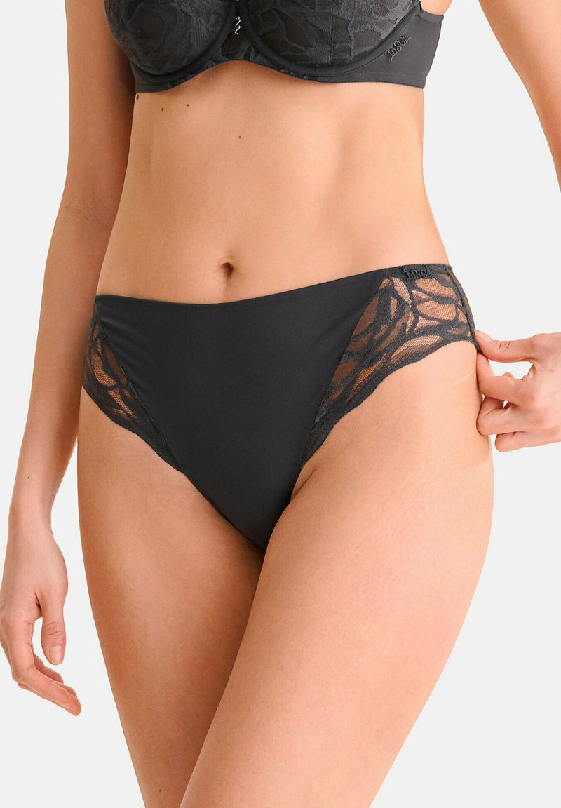 Zwarte bikini briefs met kanten accenten aan de zijkanten, een glad hoofdmateriaal, een mid-rise ontwerp en een comfortabele pasvorm.