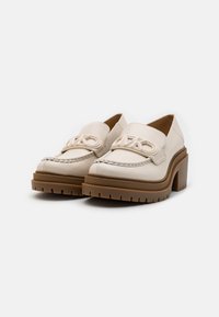Beiga läderslippers med en texturerad gummisula, med en sydd accent och ett dekorativt band över framfoten. Kraftig klackdesign.