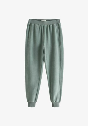 Fleece-Jogginghosen in einem sanften Mintgrün. Mit einem elastischen Bund, zwei seitlichen Taschen und schmal zulaufenden Bündchen an den Knöcheln.
