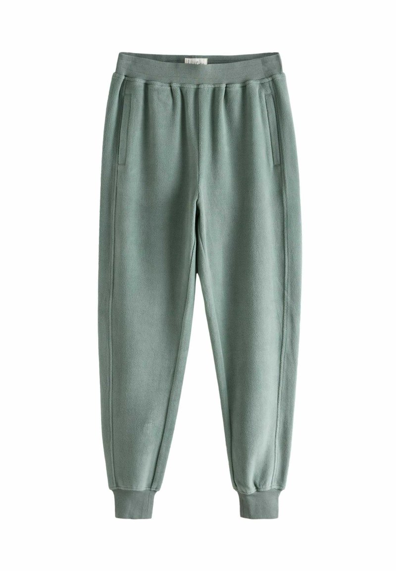 Fleece-Jogginghosen in einem sanften Mintgrün. Mit einem elastischen Bund, zwei seitlichen Taschen und schmal zulaufenden Bündchen an den Knöcheln.