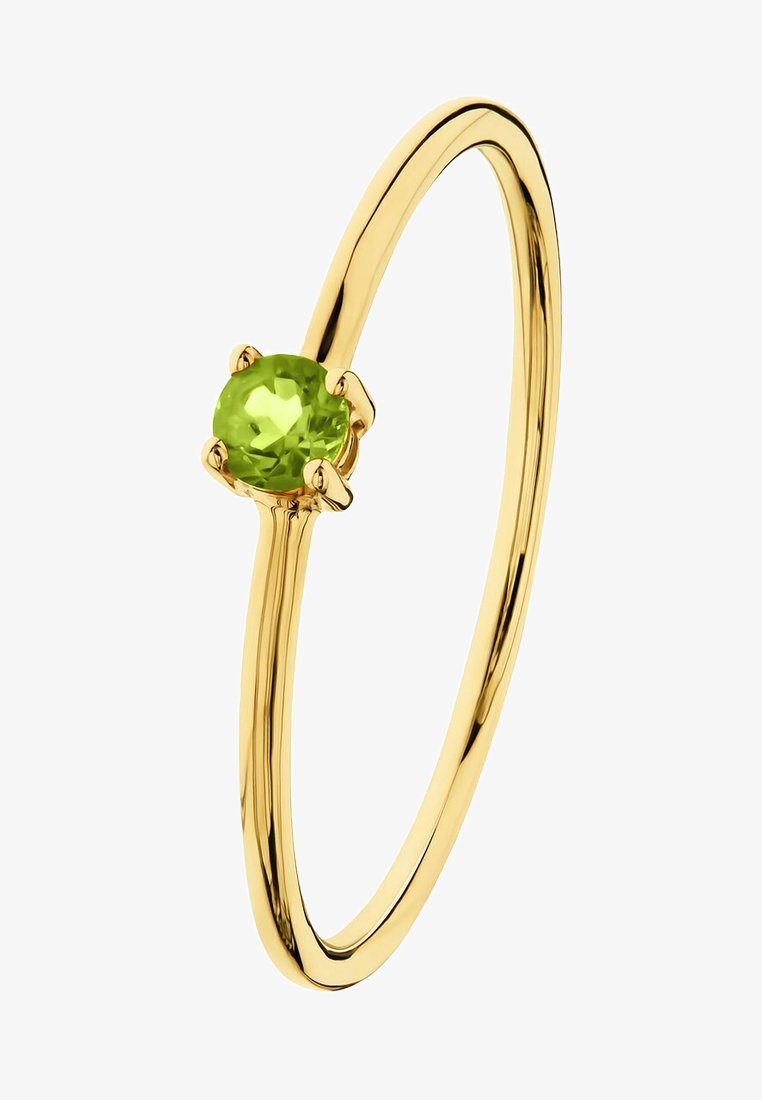 Guldring med en slät, tunn ring och en rund, ljusgrön ädelsten i en fyrklorad fattning. Enkel och elegant design.