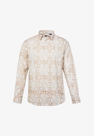 Chemise à manches longues beige clair avec un motif floral et géométrique blanc. Caractéristiques : col boutonné et boutons sur le devant. Tissu doux et texturé.
