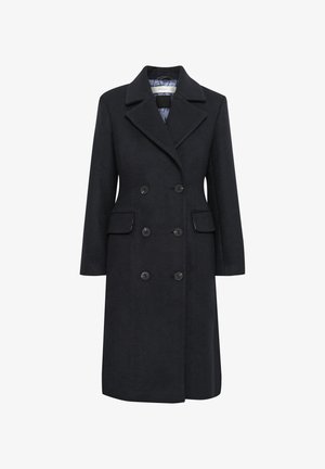 Dvojno zapnjen temno modri plašč iz mešanice volne, z odrezanimi reverji, dvema sprednjima žepoma in črnimi gumbi. Notranjost obložena s pisanimi tkaninami.