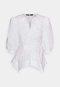 Blusa bianca con scollatura a V, maniche puff e orlo a peplo. Realizzata in un tessuto leggero con una sottile texture e dettagli arricciati.
