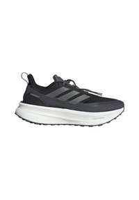 Chaussure de sport noire avec une tige en mesh et trois bandes grises. Elle est dotée d'une semelle intermédiaire épaisse blanche et d'une semelle extérieure noire texturée pour l'adhérence.