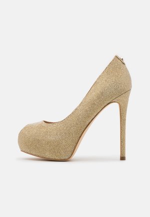 Gold high-heeled pump, featuring a textured fabric upper, rounded toe, and a high stiletto heel, with a smooth, glossy sole.
