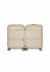 Harde koffer in lichtbeige met gouden ritsen, uitgerust met meerdere interieurzakken en compartimenten, op vier draaiwielen.