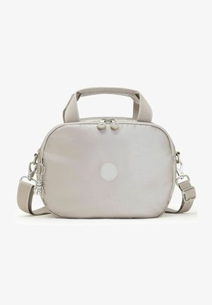 Sac banane en nylon beige avec une forme arrondie, deux zips, une poignée courte et une bandoulière réglable. Présente un détail de logo circulaire.