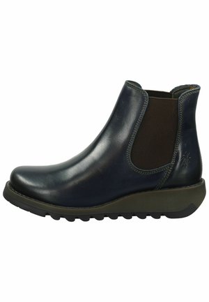 Black leather ankle boot with elastic side panels, rounded toe, and rubber sole. Features stitching accents and a textured finish.