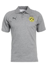 Polo gris à manches courtes avec logo Puma noir sur la poitrine droite et écusson jaune Borussia Dortmund BVB 09 avec deux étoiles sur la poitrine gauche.