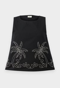 Haut noir sans manches avec motifs de palmiers brodés en blanc et volutes décoratives le long du bord inférieur.