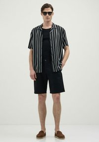 Calliope CENTRALE - Short - nero