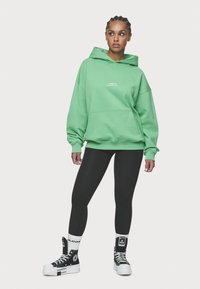 Pegador AURORA OVERSIZED HOODIE - Sportinis megztinis - washed peppermint green