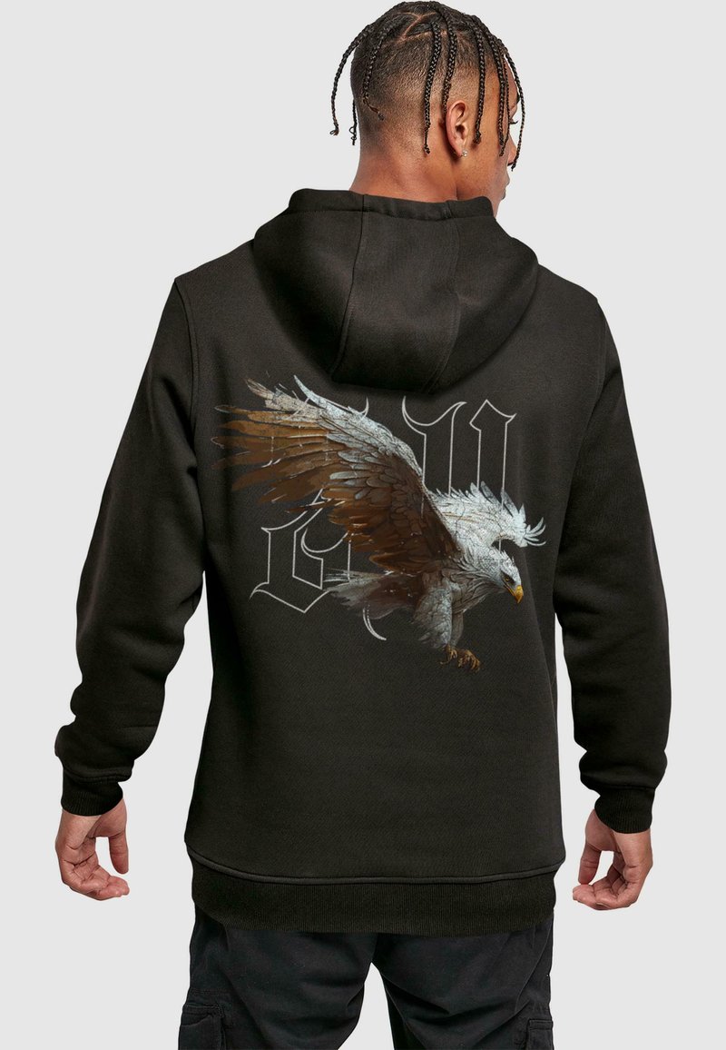 Schwarzer Kapuzenpullover mit einem großen Adler-Graphic und stilisierten Buchstaben auf dem Rücken. Mit gerippten Bündchen und Saum. Weicher Stoff.