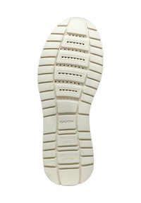 Semelle en caoutchouc blanc avec des semelles texturées, des perforations pour la respirabilité et un détail de marque en relief au niveau de la semelle intermédiaire.
