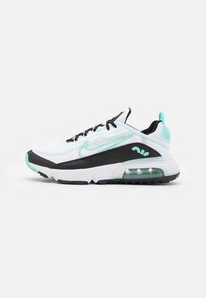 Chaussure de sport blanche et noire avec des accents vert menthe, coussin d'air visible dans la semelle, lacets noirs et tige en mesh sur un fond uni.