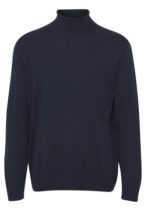 Marineblå genser med høy hals laget av myk, elastisk strikket stoff. Har lange ermer og ribbestrikket hals, mansjetter og hem for en tettsittende look.