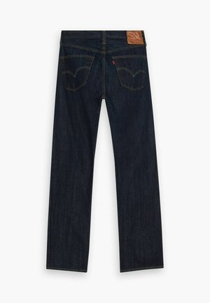 Mørkeblå denim jeans, lige ben design, med brun læderlap på taljebåndet og to baglommer med syet detaljering.