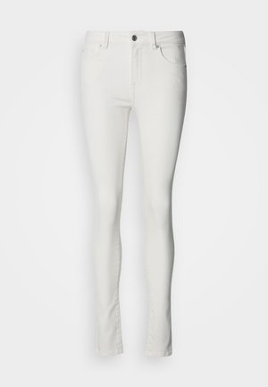 Weiße Skinny-Jeans aus Denim mit figurbetontem Design. Verfügt über einen vorderen Knopfverschluss, Gürtelschlaufen und zwei Vorderfachtaschen. Glatte Textur.