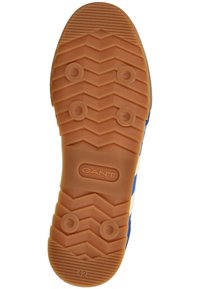 Suola in gomma con un motivo a zigzag e impugnature circolari, di colore marrone chiaro e logo "GANT", taglia 42. Design superiore blu visibile ai bordi.