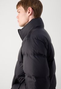 Calvin Klein PUFFER - Dunjakker - black