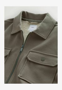 Geselecteerd, neutral brown