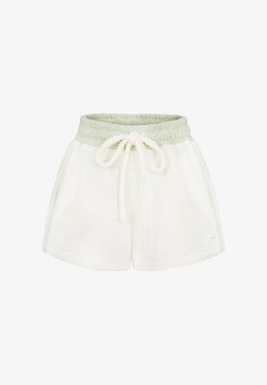 Jasnozielony top bikini z frotté o trójkątnym kroju, dopasowany do białych szortów z frotté z wiązanym paskiem w talii i miękką teksturą.