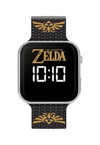 Montre intelligente carrée noire avec une lunette argentée, affichant un écran numérique indiquant "10:10" et le texte "The Legend of Zelda" en or. Bracelet noir à motif.