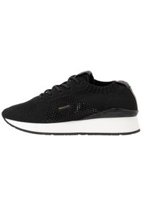 Black athletic shoe with a knitted upper, featuring ventilation holes, a white cushioned sole, and a minimalistic design. Brand logo visible.