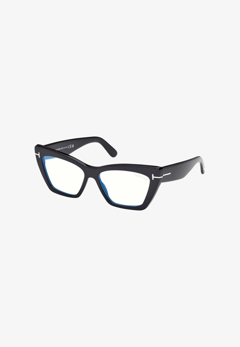 Lunettes de vue œil de chat noires avec des contours intérieurs bleus et des accents de logo "T" argentés sur les branches, fabriquées en Italie.