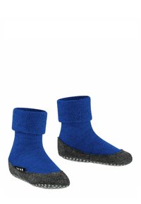 Calzini blu lavorati a maglia con risvolto, soletta in feltro grigio e puntini in gomma per una migliore aderenza. Presentano una texture liscia con forme e colori a contrasto.