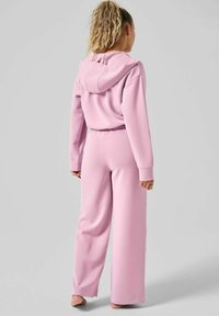 Casall PEACHY STRAIGHT LEG JOGGER - Pyjamasbyxor - winter mauve