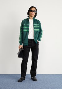 adidas Originals FIRST - Träningsjacka - mineral green