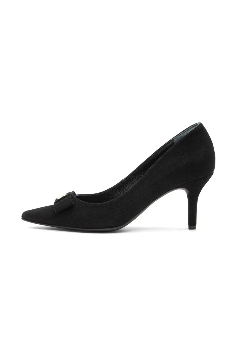 Black suede pointed-toe pump with a kitten heel and decorative bow on the front, shown in side profile on a white background.