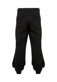 Black jogger pants in cotton blend, featuring elastic waistband, two back pockets, and tapered cuffs. Smooth texture with a relaxed fit.