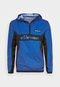 Blue and black zip-up windbreaker featuring a hood, bold "ellesse" logo on the chest, and elastic cuffs and hem. Lightweight material.