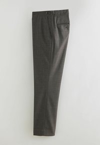 Pantalon à carreaux gris en tissu lisse, avec deux poches avant, deux poches arrière et une coupe droite.