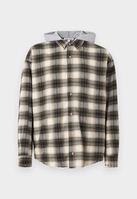 Καρό φανελένιο πουκάμισο σε κρεμ, γκρι και μαύρο με κουμπιά μπροστά, διακοσμητικά καρφιά στον γιακά και γκρι κουκούλα. Διαθέτει στρογγυλεμένη κάτω ραφή και ελαφρύ ξεφτισμένο εφέ.