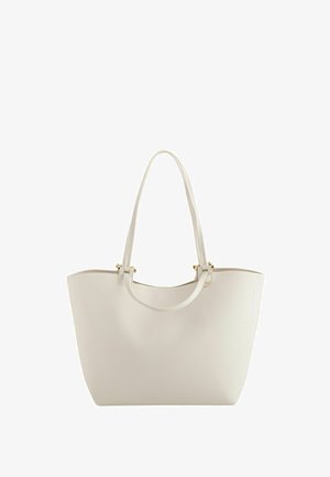 Weiße Leder-Shopper-Tasche mit zwei Griffen und goldfarbenen Beschlägen vor einfachem Hintergrund.