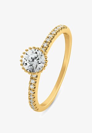 Gold ring with a large round central diamond surrounded by smaller diamonds set along the band.