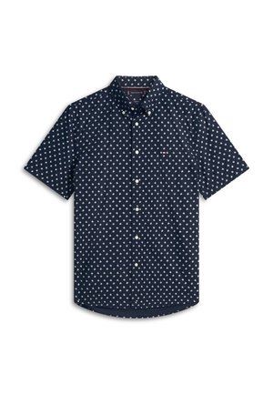 Chemise à manches courtes bleu marine avec motif géométrique blanc et col à boutons, présentée à plat sur fond blanc.