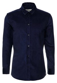 Merensininen, nappikiinnityksellä varustettu paita samettikankaasta, jossa on klassinen kaulus ja pitkät hihat. Paidassa on mustat napit ja kaartuva helma.