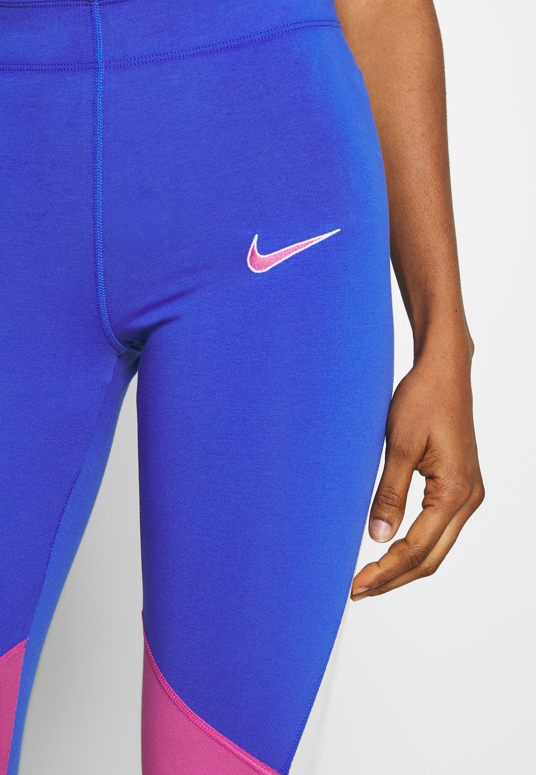 nike cosmic fuchsia leggings
